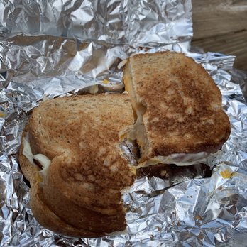 Eau Claire Cheese And Deli - a half eaten sandwich - Cheese Shops Near Me - Eau Claire, Wisconsin