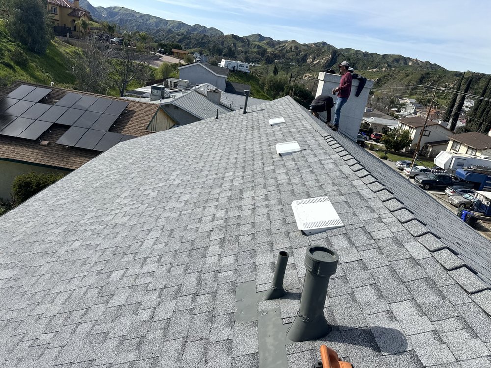 Slide of Twins Roofing