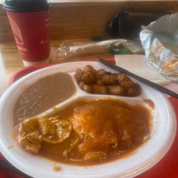 Taqueria El Arquito - A very bad presentation of huevos rancheros Slopped onto the plate. With the tortillas on the side in foil. - Breakfast & Brunch Near Me - Dallas, Texas Taqueria El Arquito - A very bad presentation of huevos rancheros Slopped onto the plate. With the tortillas on the side in foil. - Breakfast & Brunch Near Me - Dallas, Texas