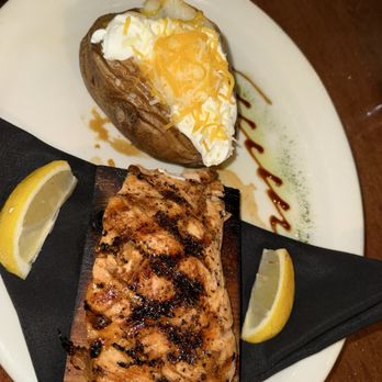 Lock Stock & Barrel - Cedar Plank Salmon with baked potato - Steakhouses Near Me - Boise, Idaho Lock Stock & Barrel - Cedar Plank Salmon with baked potato - Steakhouses Near Me - Boise, Idaho