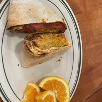Kavarna Coffeehouse - Greek Tofu Wrap - Coffee & Tea Near Me - Green Bay, Wisconsin Kavarna Coffeehouse - Greek Tofu Wrap - Coffee & Tea Near Me - Green Bay, Wisconsin