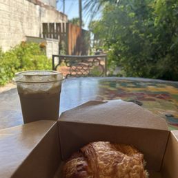 Bacon & cheese croissant + iced chai with shot of decaf
