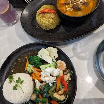 Sense of Thai - (Top to Bottom): Lamb Massamun Curry and Seafood Volcano - Thai Near Me - Chantilly, Virginia Sense of Thai - (Top to Bottom): Lamb Massamun Curry and Seafood Volcano - Thai Near Me - Chantilly, Virginia