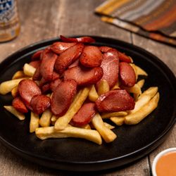 Simple Peruvian - Sunnyside - Salchipapas
A popular Peruvian street food, featuring sliced sausage and French fries. Served with a special dipping sauce.