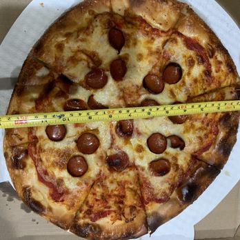 The Landing Bar & Grill - 23$ Large 16" pizza. It's actually 12" - American Near Me - Valrico, Florida The Landing Bar & Grill - 23$ Large 16" pizza. It's actually 12" - American Near Me - Valrico, Florida
