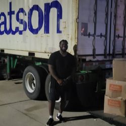L&H Moving Company - Timothy offloading our 20' shipping container, at night, with no complaints! Outstanding service!