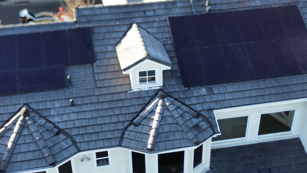 Slide of Pacific Roofers