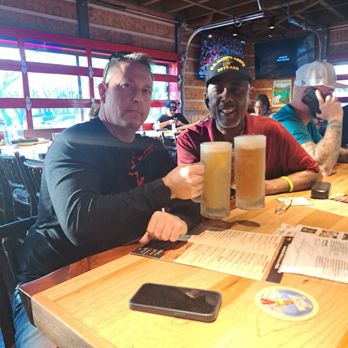 Twin Peaks - Mike and I with our frosted mugs of beer! - New American Near Me - Brandon, Florida