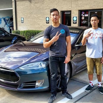Clutch City Custom - Here is a picture of us. Tony Ho left , Tuan ho right. We just finished up Auto Flexing the Tesla! Came out beautiful - Vehicle Wraps Near Me - Houston, Texas