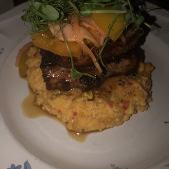 Whiskey Cake - Tbone lamb and grits. OMG. Amazing. Two meaty, well seasoned chops. - New American Near Me - Plano, Texas Whiskey Cake - Tbone lamb and grits. OMG. Amazing. Two meaty, well seasoned chops. - New American Near Me - Plano, Texas