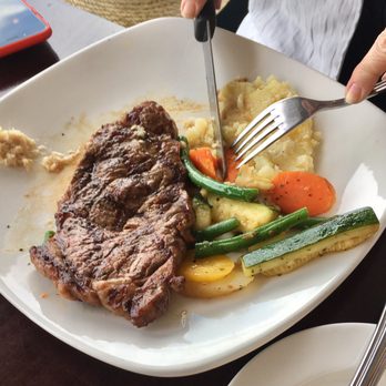 Elements on the Falls - Strip lion, potato mash and veggies. - Canadian (New) Near Me - Niagara Falls, Ontario Elements on the Falls - Strip lion, potato mash and veggies. - Canadian (New) Near Me - Niagara Falls, Ontario