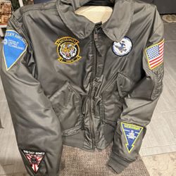 Ace Uniforms - Patches sewn on US NAVY CWU-45 nylon bomber jacket.