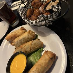 Delaney's Irish Pub & Grill - Cheesesteak eggrolls and pretzel bites.