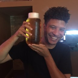 64oz mason jar of beer for $9. Bigger than most heads.