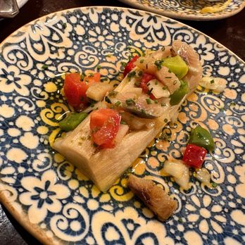 Casa Alberto - Puerro a la Brasa con Vinagreta de Anchoas - Grilled Leek with Anchovy Vinaigrette - Spanish Near Me - Madrid, M Casa Alberto - Puerro a la Brasa con Vinagreta de Anchoas - Grilled Leek with Anchovy Vinaigrette - Spanish Near Me - Madrid, M