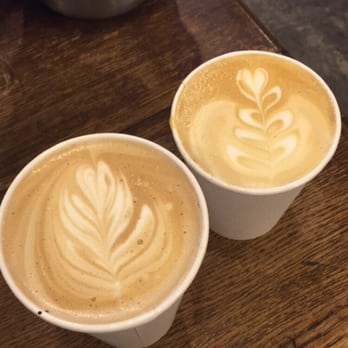Victrola Coffee Roasters - Two black and white lattes - Coffee Roasteries Near Me - Seattle, Washington