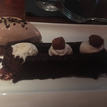 Vermilion - Flourless chocolate cake with hazelnut ice cream - New American Near Me - Alexandria, Virginia Vermilion - Flourless chocolate cake with hazelnut ice cream - New American Near Me - Alexandria, Virginia