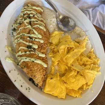 Toast - Fried catfish with grits and scrambled eggs - Breakfast & Brunch Near Me - New Orleans, Louisiana Toast - Fried catfish with grits and scrambled eggs - Breakfast & Brunch Near Me - New Orleans, Louisiana