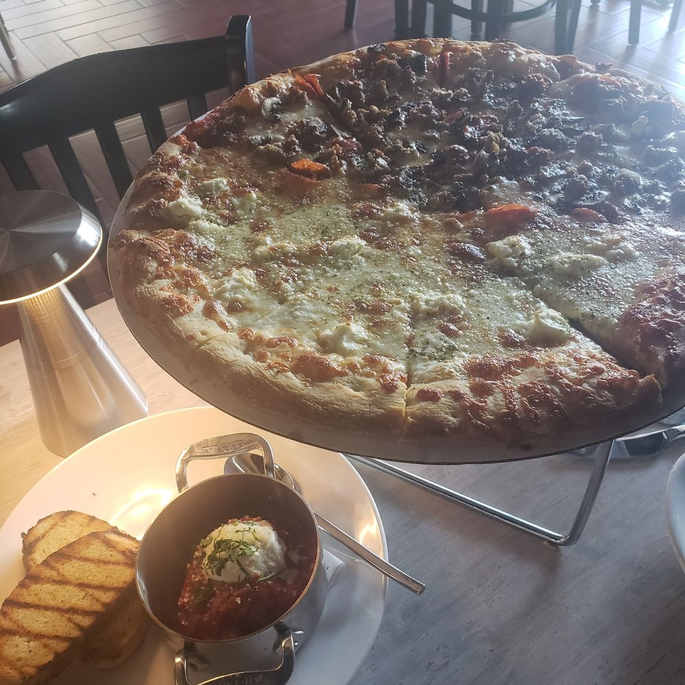 Bricco - Half c-5, half blue collar pizza. And bottom corner is their giant meatball - Pizza Near Me - Laguna Niguel, California Bricco - Half c-5, half blue collar pizza. And bottom corner is their giant meatball - Pizza Near Me - Laguna Niguel, California