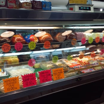 Rex's - a display case filled with food - Delis Near Me - Baltimore, Maryland