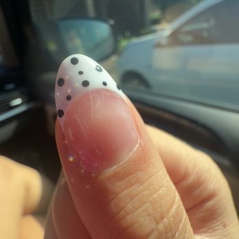 Sahara Nails and Lashes - Visible air bubbles and a hair stuck in the paint. - Nail Salons Near Me - Orange, California Sahara Nails and Lashes - Visible air bubbles and a hair stuck in the paint. - Nail Salons Near Me - Orange, California