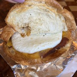 Honeycutt Coffee - Croissant sandwich with egg, cheddar cheese, and turkey bacon