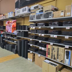 Electronic Express - Home theater section with Cleveland Electronic Express. This section showcases home theater receivers, speakers, and subwoofers