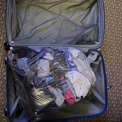 Laundry Today - Clean clothes returned folded in a plastic bag in my suitcase