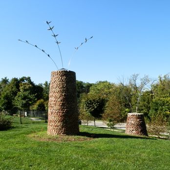 Brookside Parkway Sculptures - History and Preservation by Tommy Reddicks (2016) by Paramount School of Excellence - Public Art Near Me - Indianapolis, Indiana