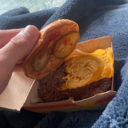 McDonald's - They slopped this burger together whys the cheese halfway off, no bacon!!!!!