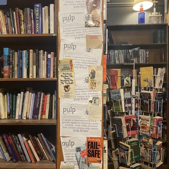 Mutiny Information Cafe - a bookshelf full of books - Coffee & Tea Near Me - Englewood, Colorado