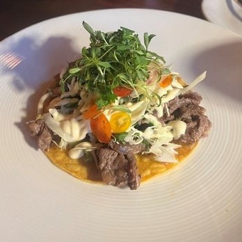 Toro Bravo - Steak Tostada. Event the cilantro was so good... so delicate and bursting with flavor. - Steakhouses Near Me - Reno, Nevada Toro Bravo - Steak Tostada. Event the cilantro was so good... so delicate and bursting with flavor. - Steakhouses Near Me - Reno, Nevada