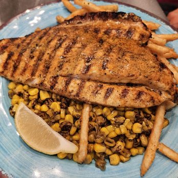 Simply Fish Seafood - The Sea Bass was a thin big piece. Next time I should get the Chilean Sea Bass for a thicker bigger chunk of fish. - Fish & Chips Near Me - Costa Mesa, California