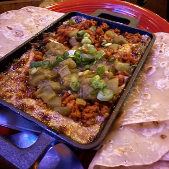 Taqueria Outlaw - Queso Fundido with chorizo and green chilies - Mexican Near Me - Bisbee, Arizona Taqueria Outlaw - Queso Fundido with chorizo and green chilies - Mexican Near Me - Bisbee, Arizona