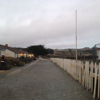 HI-Pigeon Point Lighthouse Hostel - Dusk view.  Hostel to the left, unseen lighthouse to the right. - Hostels Near Me - Pescadero, California
