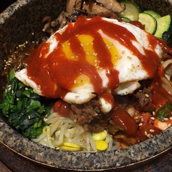 Burning Rice - Kimchi rice, spicy bulgogi and all of the toppings in the hot stone bowl - Korean Near Me - Frisco, Texas