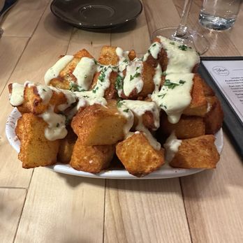 Triana - Patatas bravas- cooked to perfection room with delicious aioli - Tapas/Small Plates Near Me - Albuquerque, New Mexico