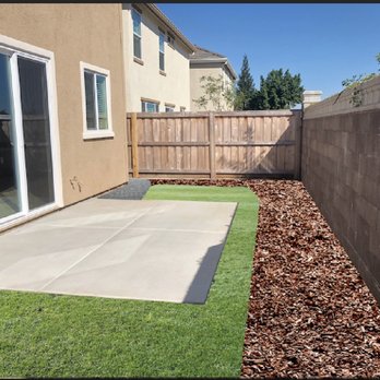 Tellez Landscaping - Projected image of what the patio area would look like with the grass and additional concrete path. - Landscaping Near Me