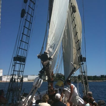 Schooner Thomas E Lannon - Half-way through raising the sails - Boat Charters Near Me - Gloucester, Massachusetts