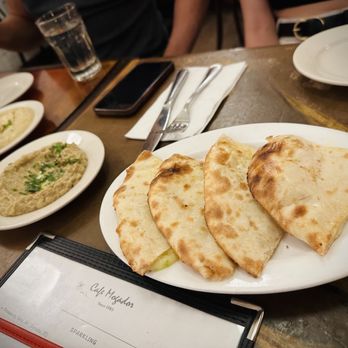 Cafe Mogador - Jalapeño cheese naan and spreads - Moroccan Near Me - Brooklyn, New York Cafe Mogador - Jalapeño cheese naan and spreads - Moroccan Near Me - Brooklyn, New York