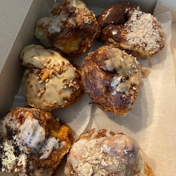 Parlor Doughnuts - clockwise: oreo, maple pecan, maple bacon, churro, french toast, and vanilla sugar - Donuts Near Me - Nashville, Tennessee