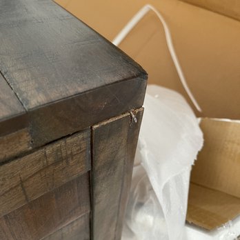 Ashley Store - I love when random nails are sticking out of your brand new table. - Furniture Stores Near Me - Sterling, Virginia