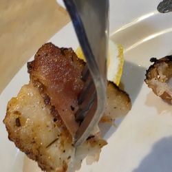 Harbor Inn Seafood - A scallop wrapped in bacon. Looked wonderful and tasted amazing.