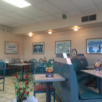 Arby's - Inside of the restaurant. Several airplane photos line the walls. - Fast Food Near Me - Universal City, Texas
