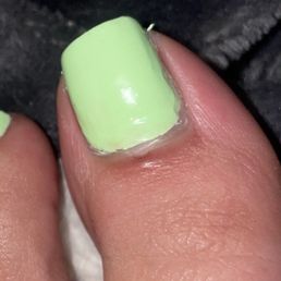 Cut on big toe, poor paint job Cut on big toe, poor paint job