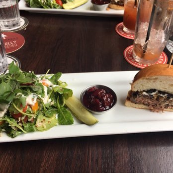 Red Cow North Loop - Bison Burger with the Arugala Salad- split in half for us to share:) - New American Near Me - Minneapolis, Minnesota Red Cow North Loop - Bison Burger with the Arugala Salad- split in half for us to share:) - New American Near Me - Minneapolis, Minnesota
