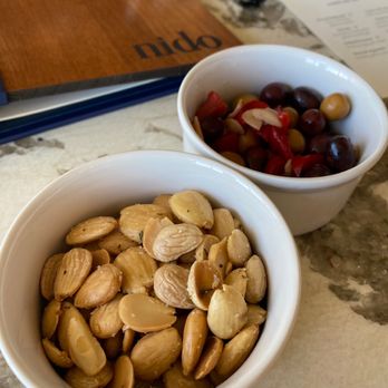 Nido - Almonds and olives - New American Near Me - Austin, Texas