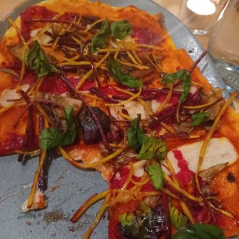 Luma Bar & Eatery - Half eaten beetza (beet flatbread) - Mediterranean Near Me - Petaluma, California Luma Bar & Eatery - Half eaten beetza (beet flatbread) - Mediterranean Near Me - Petaluma, California