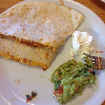 Casa Lupitas - Breakfast quesadilla with chorizo, side of guac and sour cream. So good! - Mexican Near Me - Castaic, California