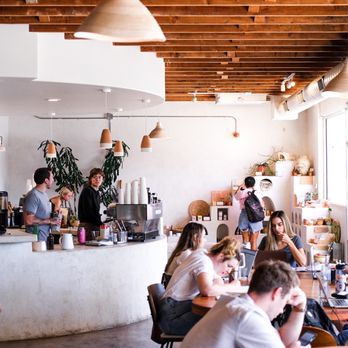 Palomino Coffee - people sitting at tables in a cafe - Coffee & Tea Near Me - Austin, Texas Palomino Coffee - people sitting at tables in a cafe - Coffee & Tea Near Me - Austin, Texas
